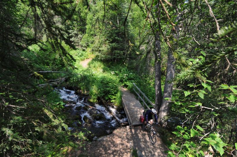 The singletrack climb up to Resurrection Pass forded clear creeks. 