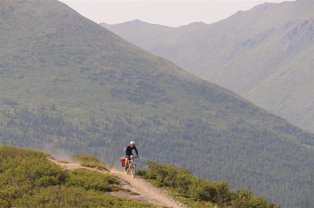 Until it emerged onto open land towards the top of the pass. 