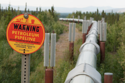 Incredibly, the road comes within metres of the pipeline, so close you can reach out and touch it. Presumably, a satellite keeps a watchful eye on its entire length. No eletric fences, no checkpoints. Occasionally, a helicopter would swoop by overhead. 