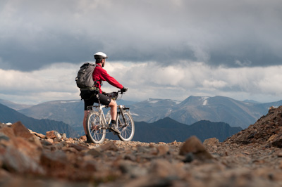 As a beam of light pierces the clouds, Dan stops to soak up the views. 