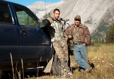 At the foot of Elk Pass, Hunters Mario and Mike show me through their scope a magnificent Rocky Mountain goat, it's back arched proudly as it stands on a rocky outcrop. Luckily, it's too far for them to get...