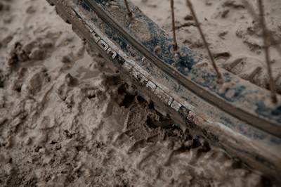 Except that the snow and drizzle that was now falling turned the clay-based surface to a tacky mush that sucked on our wheels - gumball, the locals call it. 