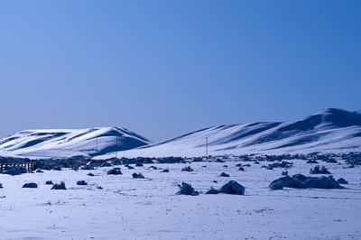 When I got on the road the next morning, it was 10F, that's -12C! I wore all my layers, even my jeans, on the long climb. 