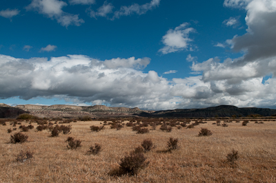 On the other side of the pass, it was a completely different topography. Dry, arid, with mineral streaked rocks. 