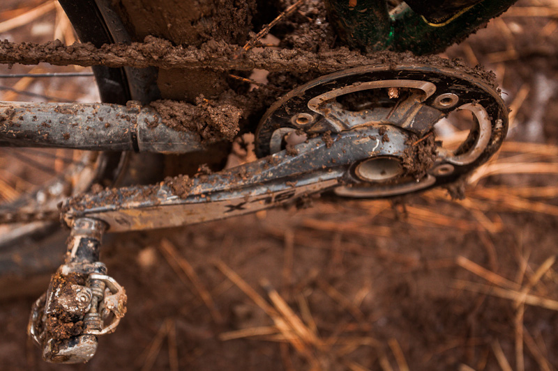 Being both steep and muddy, I was down in my lowest gear. Unfortunately, a tight wheel clearance meant mud was being carried by the rubbing chain into the chainring...